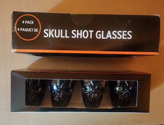 4 pk plastic skull shot glasses